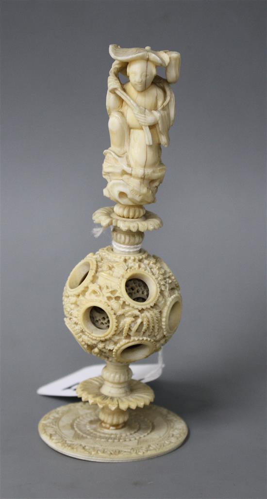 A Chinese concentric ball on stand, height 15cm